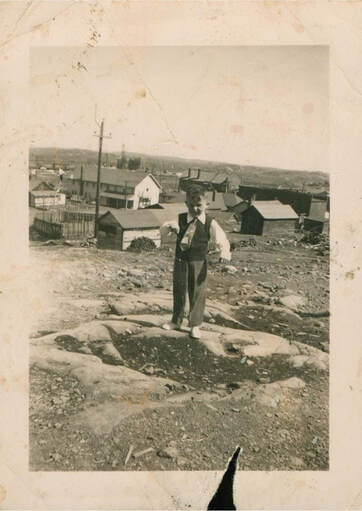Young boy on barren hills of Creighton Mine, murder mystery novel